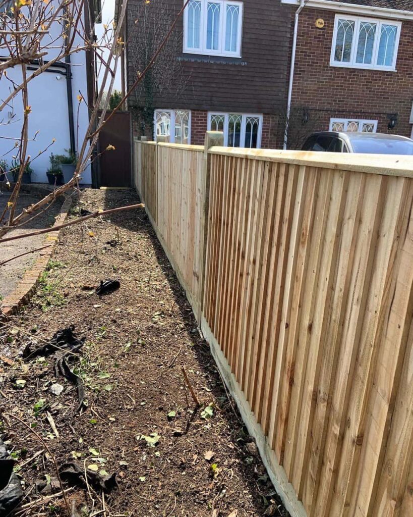 This is a photo of feather edge fencing installed in a residential property by Fast Fix Fencing Biggen Hill